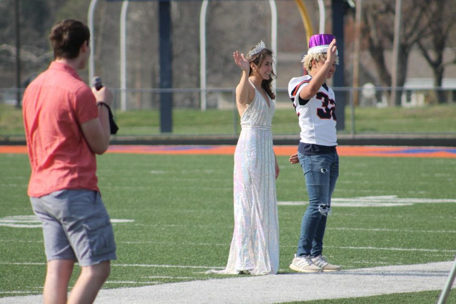 Noah Adams (12) sings There She Is by Frank Turner as Annabelle Barnstable and Jaxon Allen wave to the people in the stands.