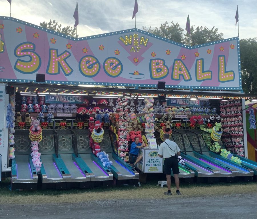 In DuQuoin State Fair there lies a game called Skee Ball, where you must get up to 150 points to win, but every time a person inserts a coin the score starts over. 