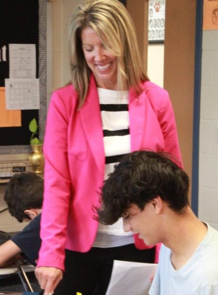 Mrs. Hubbard helps sophomore Jamieson Jones during his English II class.
