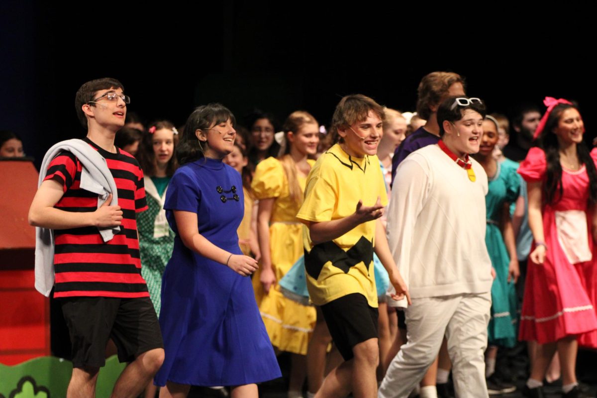 Members of the main cast (Left to right: Maddox Seaman, Karlie Jeralds, Logan Drew, and Kash Compton) take the stage for their final bow during Happiness.