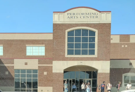 Carterville High School students leaving school at parent pickup.