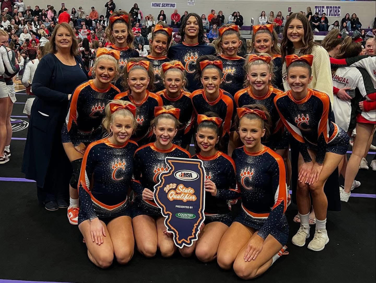 Carterville Cheer Team posing together after they qualified for state.