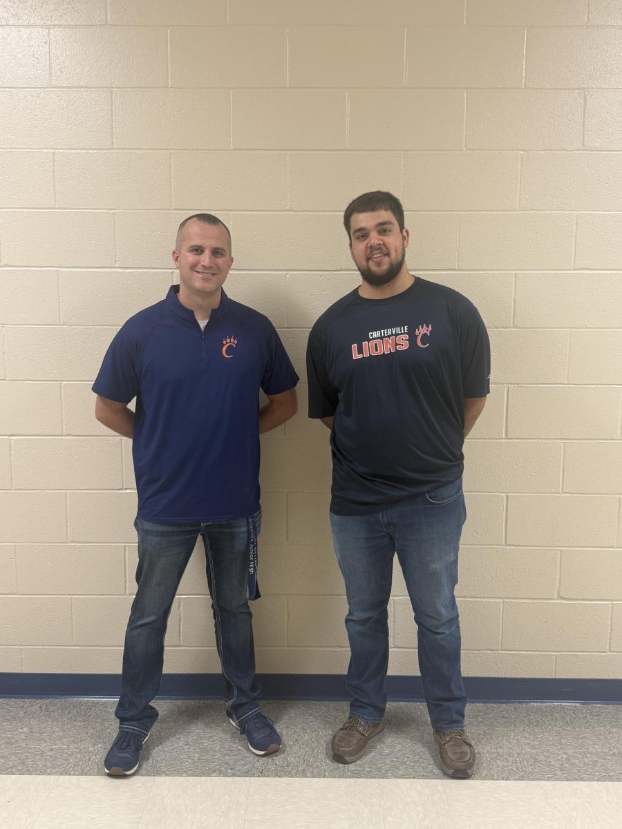 Mr. Herbst and Mr. Schlabach put on their best smiles for their article. 