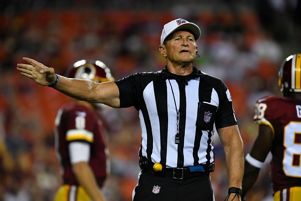 LANDOVER, MD - AUGUST 26:  Referee Ed Hochuli #85 makes a call during the game between the Washington Redskins and the Buffalo Bills at FedExField on August 26, 2016 in Landover, Maryland. The Redskins defeated the Jets 22-18. (Photo by Larry French/Getty Images)