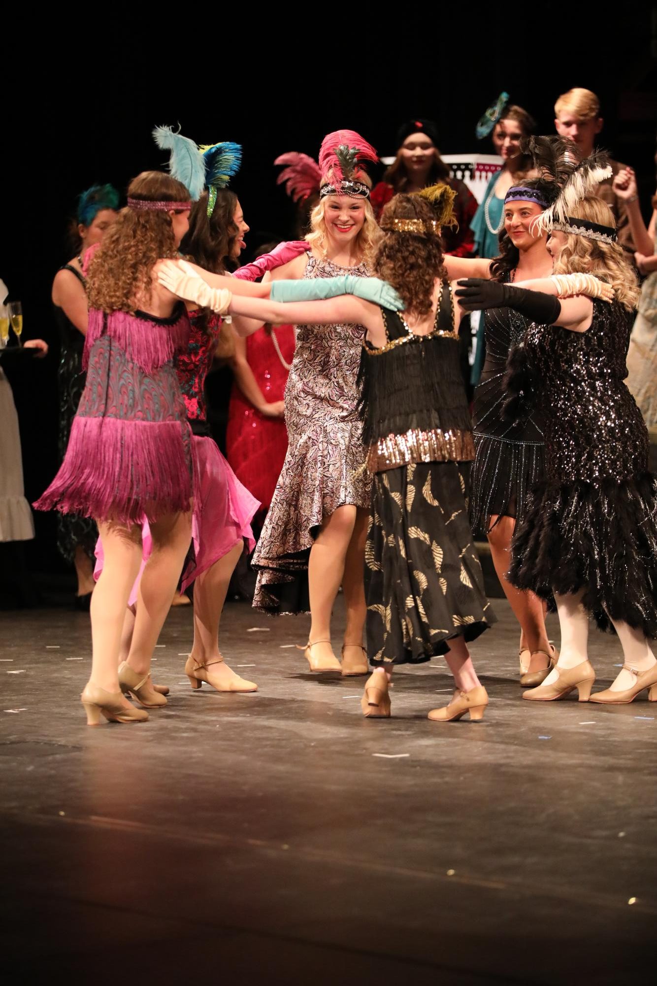 The dancers perform their dance routine during act 1 of the play.