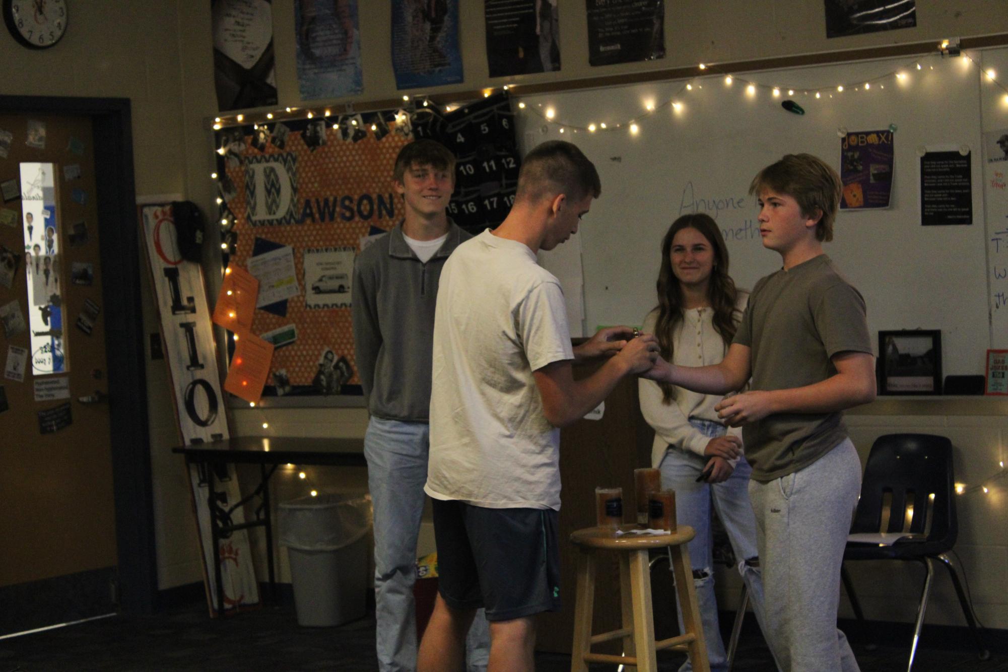 Sophomores Olin Clark, Bailie Sims, Lane Sykes, and Brezden Burkey, doing their presentations for Mrs. Dawson's English II class while getting ready for upcoming final exams. 