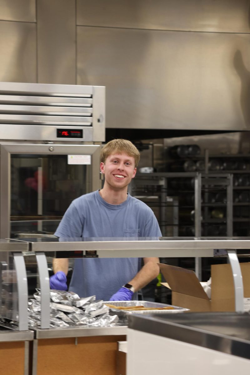 CHS senior Landon Mayhew volunteers to serve at the annual Fazoli Dinner hosted by the senior class.  