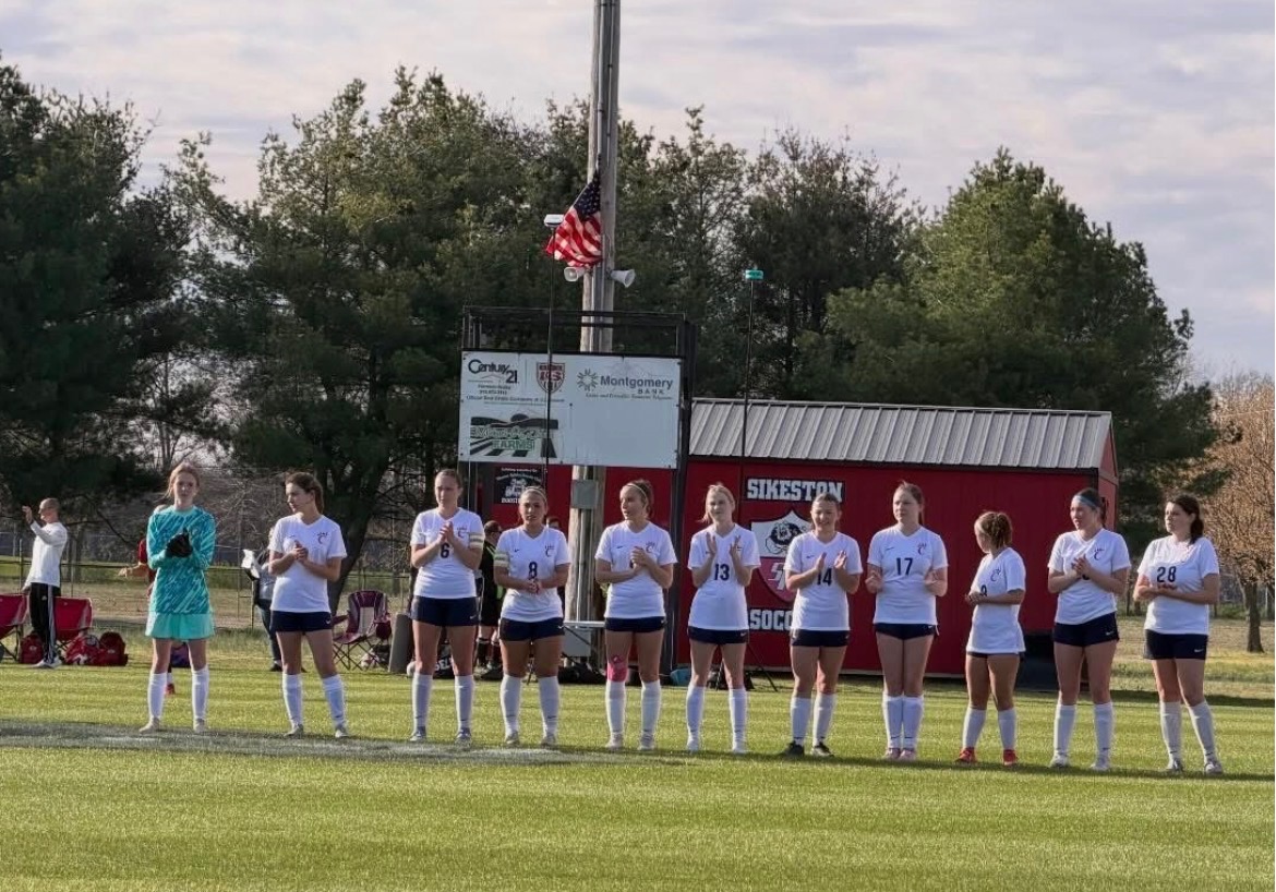 Starting lineup for the girls first soccer game. 