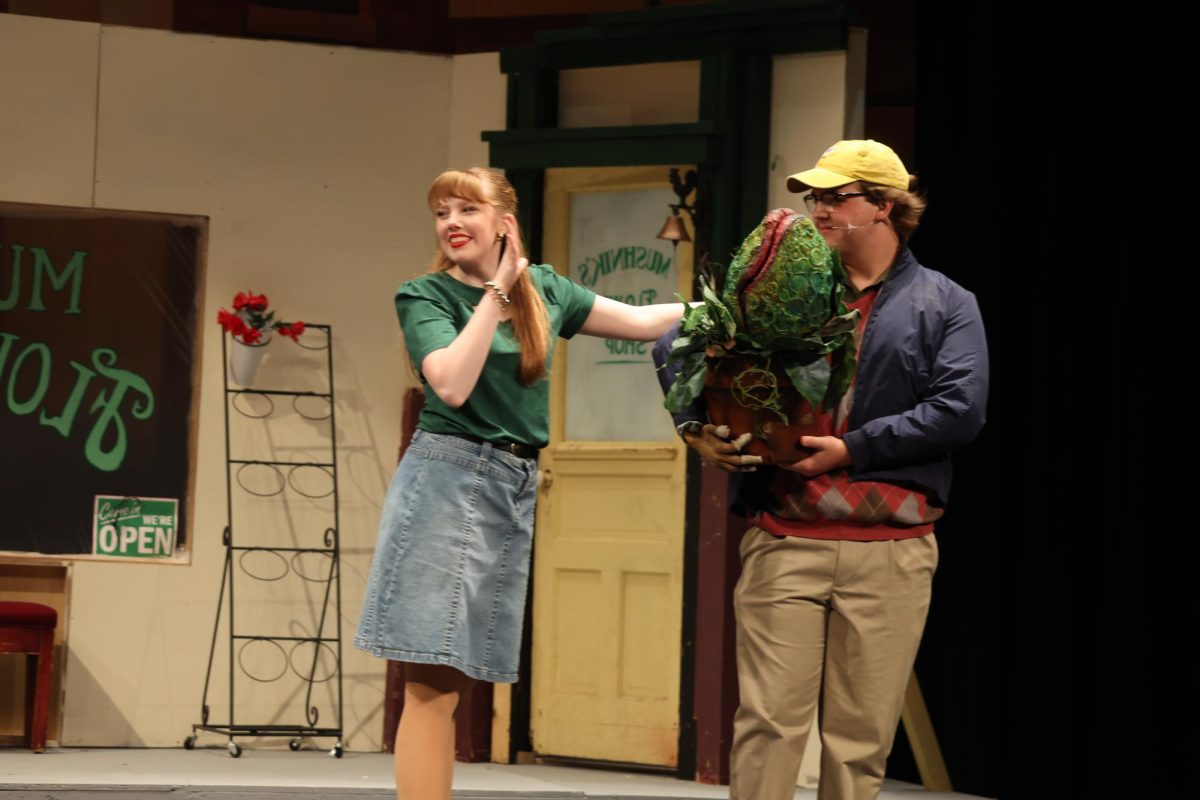 CHS juniors Chloe Williams and Evan Miranti singing a song during a dress rehearsal for the spring musical.