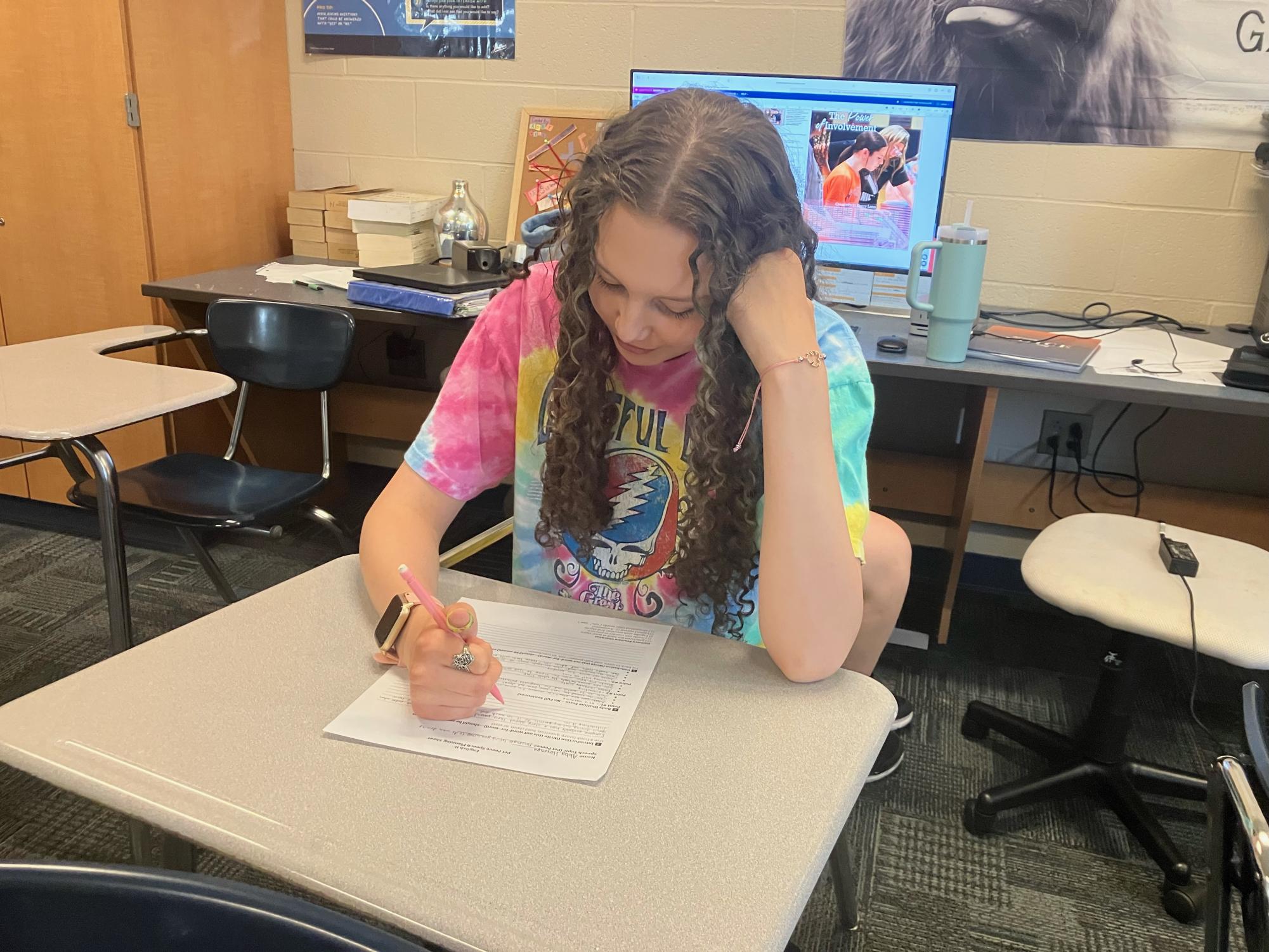 Sophomore Abby Hovenga studying for an English quiz.